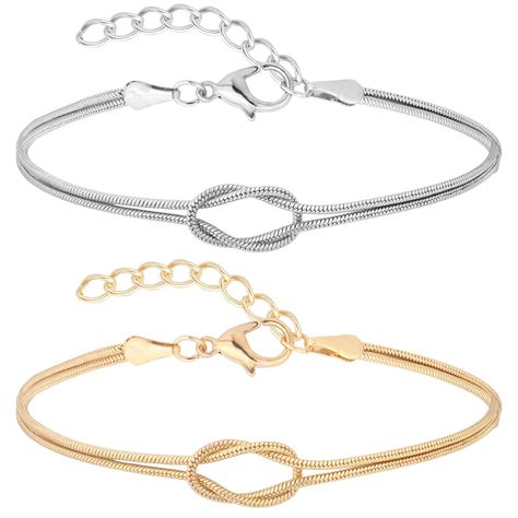 PRICES MAY VARY. Material: 925 silver gold-plated, Size：7.8 inch main chain+1.97 inch extension chain Design concept：This Unisex Infinity Love Knot Bracelet Set is more than just a jewelry piece - it's a symbol of your eternal love. Handcrafted with care and precision, these bracelets feature a sleek snake chain knot design that is both elegant and timeless. The perfect gift for couples, these bracelets will be cherished as a reminder of your love for each other for years to come. Love Knot Coup Simple Matching Bracelets, Couple Matching Jewelry, Matching Bracelets For Couples, Friendship Relationship, Bracelets For Couples, Bracelet Couples, Relationship Bracelets, Matching Couple Bracelets, Couples Bracelets