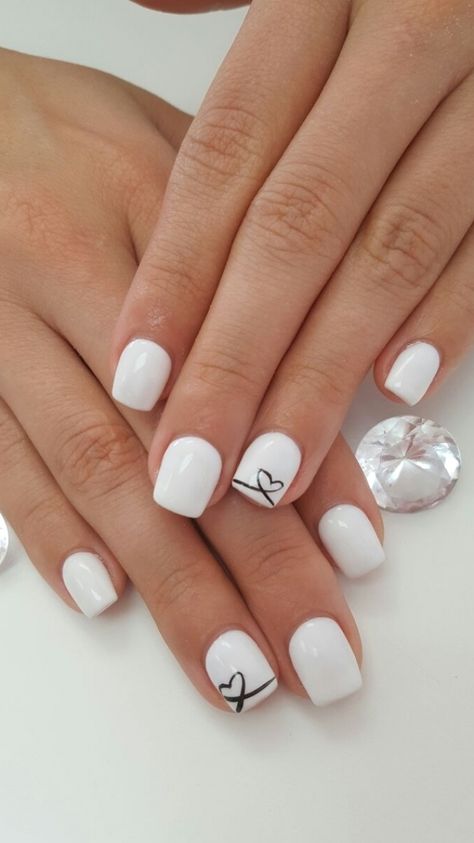 White Nails With Designs Valentines, White Nails With Valentine Design, Pretty Short Nails Simple White, Shellac Nails White Design, White Nails With Designs Gel, Nail Art With White Polish, White Nails For Valentines Day, White Nails With Black Heart Art Designs, White Nails Inspiration Short