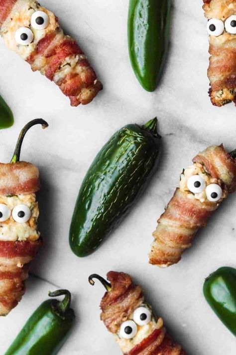 1 reviews · 20 minutes · Gluten free · Serves 1 · These bacon wrapped jalapeno popper mummies are an easy, fun and festive recipe idea to spice up your Halloween party! To make them: take jalapeno peppers, scoop out the seeds, stuff with cream cheese… More Popper Recipes, Baked Jalapeno Poppers, Keto Halloween, Yummy Mummies, Bacon Wrapped Jalapeno Poppers, Jalapeno Popper Recipes, Candy Eyes, Bacon Wrapped Jalapenos, Roasted Jalapeno