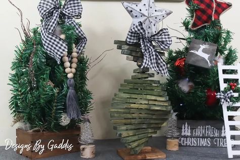 This tumbling tower Christmas tree DIY is a simple and fun way to decorate your home this Christmas season. Grab a few boxes of Dollar Tree Tumbling Tower Blocks and create your own rustic farmhouse Christmas Tree.
 

 
I love this unique table top Christmas tree. It is unique and one of a kind! 
Step 1. Assemble the Base.
  I used 10 blocks to assemble the base for the tree.   
Step 2. Assemble Tree Branches.
  Hot glue 3 tumbling tower blocks together, end to end.  Hot glue a craft s… Rustic Farmhouse Christmas Tree, Rustic Farmhouse Christmas, Bathroom Crafts, Fire Pit Furniture, Christmas Tree Diy, How To Clean Silver, Doors And Floors, Farmhouse Christmas Tree, Tower Block