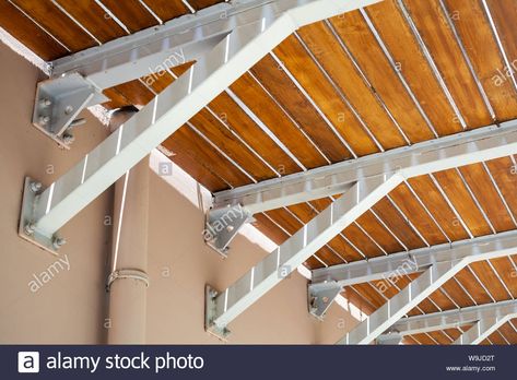 Wooden balcony floor mounted on cantilever beams, bottom view Stock Photo Steel Brackets For Beams, Cantilever Deck Design, Cantilever Balcony Design, Floating Balcony, Cantilevered Balcony, Balcony Addition, Types Of Kitchen Flooring, Cantilever Balcony, Cantilever Architecture