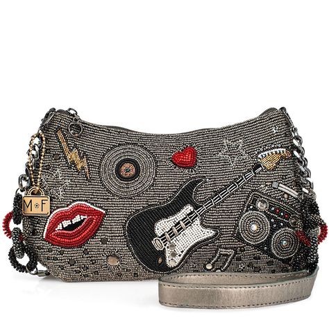 Mary Frances Rock & Soul Crossbody Handbag Ditch the boring bags and rock out with our 'Rock & Soul' beaded crossbody handbag. Accented with a patch-look design featuring lips, guitar, radio, record, heart, stars and a lightning bolt. This beaded beauty is perfect for music lovers with a taste for the alternative. Dimensions: 11 x 1 x 6.25", Strap Length: 49", Strap Drop: 24.5", Features: Removable chain and leather crossbody strap, zipper closure, inside pocket, back pocket, metal logo fob, protective storage bag, certificate of authenticity, fits a THIS IS A HANDMADE ITEM, EACH ONE AN INDIVIDUAL WORK OF ART. SLIGHT VARIATIONS MAY OCCUR. I am a authorized retailer for Mary Frances Handbags    Must be returned as received in new condition as received with all the tags and wrappings ....Tha Sparkly Purse, Mary Frances Handbags, Big Handbags, Upcycled Bag, Mary Frances, Purse Gift, Best Handbags, Handmade Purses, Top Handle Handbags