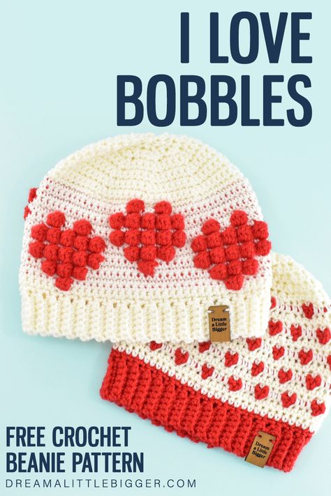 Love Bobbles? Grab this free Crochet Pattern to make the cutest beanies that feature hearts made from crochet bobbles! Joining Crochet Squares, Valentine Hats, Beanie Pattern Free, Crochet Valentines, Crochet Beanie Pattern Free, Bobble Crochet, Crochet Bobble, Foundation Single Crochet, Crochet Heart Pattern