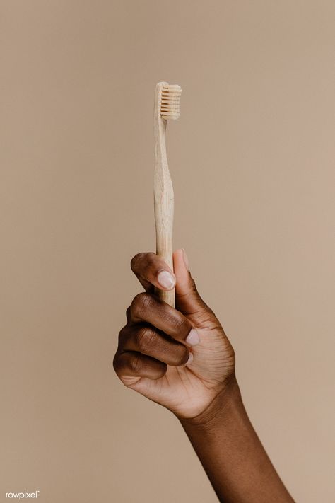 Black hand holding a wooden toothbrush | premium image by rawpixel.com / McKinsey Dentist Branding, Wooden Toothbrush, Sikat Gigi, Toothbrush Storage, Dental Art, Tooth Brush, Bamboo Toothbrush, Hand Holding, Bag Trends