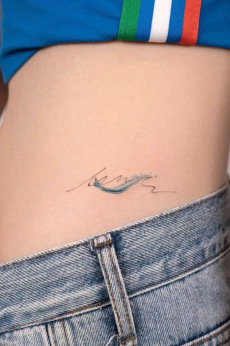 32 Magnificent Wave Tattoo Designs Single Line Ocean Tattoo, Beach Waves Tattoo Ideas, Wave Tattoo Thigh, Small Water Tattoo Ideas, Wave Flower Tattoo, Simple Wave Tattoo Design, Ocean Wave Tattoos For Women, Small Wave Tattoos For Women, Ocean Beach Tattoo