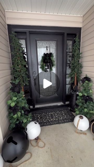 Gilla Leigh Home Designs on Instagram: "I wanted to share a few different ways I decorated my porch for Christmas this year. I’ve already shared a Reel using Christmas red and white decor on my porch. Now, I wanted to share a more organic Christmas design. A very trending Christmas style this year is organic Christmas decor. This Christmas design is very popular right now . Using more natural earthy tones for christmas. lots of green, black, wood , and greenery. If you want to change up some of your Christmas decor this year, you don’t always need to go buy new, just paint them. I chose to paint my red Bella black and my red christmas sign white. It transformed the look of my front porch completely. Most of the Christmas decor shown here (sled, jumbo bells, and sign )that I purchased a Black And White Christmas Porch, Organic Christmas Decor, Red And White Decor, Organic Christmas, Christmas Red And White, Trending Christmas, Christmas Style, Xmas Ideas, Christmas Trends