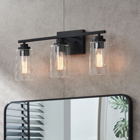 KAWOTI 3 Light Bathroom Vanity Light with Clear Glass Shade - Bed Bath & Beyond - 37174766 Black Vanity Bathroom Lights, Art Deco Bathroom Vanity, Sunrise House, 3 Light Bathroom Vanity Light, Light Bathroom Vanity, Black Vanity Bathroom, Art Deco Bathroom, Light Bathroom, Bathroom Vanity Light