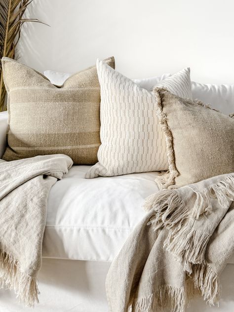 Indulge in the elegance of this hand-loomed French linen cushion, crafted to perfection for a luxurious touch. Its rustic texture showcases the varying tones of natural flax and intricate hand weave techniques, adding charm and character to any room.With a dual-sided design, the Kyoto offers versatility, featuring a stonewashed linen finish on one side and a coconut button closure. Display as a vertical or horizontal pattern, Both equally stunning, making it a perfect addition to your space. Thi Cushion Combinations, Contrast Texture, Light Sofa, Linen Cushions, Bedroom Space, Linen Sofa, Cushion Inserts, White Colors, Linen Cushion