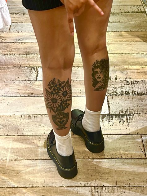 Below Knee Tattoo Traditional, All Black American Traditional Tattoo, Trad Rib Tattoo, Traditional Tattoos Words, Womens Sunflower Tattoo, Knee Tattoo Patchwork, Large Calf Tattoo, Traditional Tattoo Vase Flowers, Traditional Style Woman Tattoo