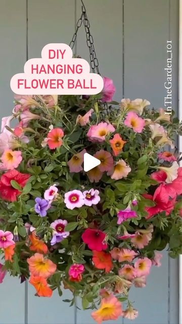 Diy Flower Ball, Balcony Oasis, Hanging Baskets Diy, Hanging Flower Arrangements, Front Porch Flower Pots, Dollar Tree Flowers, Outdoor Improvements, Hanging Wire Basket, Hanging Plants Diy