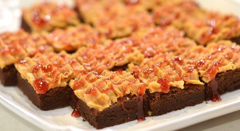 Patricia Heaton combines two classic treats to make her Chocolate Brownies with Peanut Butter and Jelly Frosting Best Brownie Mix, Brownies With Peanut Butter, Classic Brownies, Patricia Heaton, Sugar Dough, Cereal Bar, Chocolate Cheese, Peanut Butter Brownies, Peanut Butter And Jelly