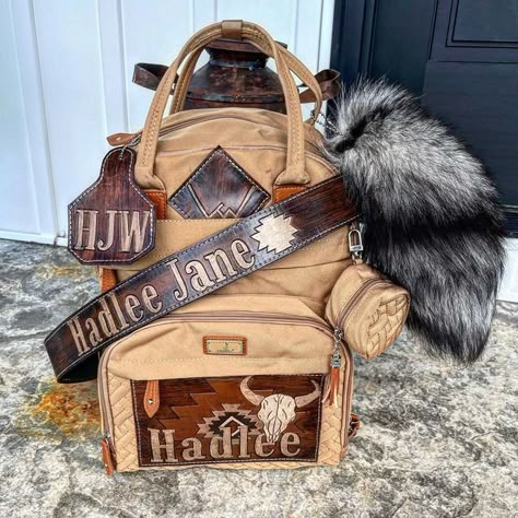 Kustom K Leather on Instagram: "These diaper bags leave me speechless! In love with them! Message me for details on a custom diaper bag! #custom #diaperbag #baby rodeo #rodeofashion #southwestern #leather #handtooled #handpainted #foxtail #beautiful #brand #kustomkleather" Western Baby Gifts, Tooled Leather Diaper Bag, Boujee Bags, Western Diaper Bag, Diper Bags, Leather Diaper Bag Backpack, Cowboy Nursery, Western Nursery, Cow Nursery