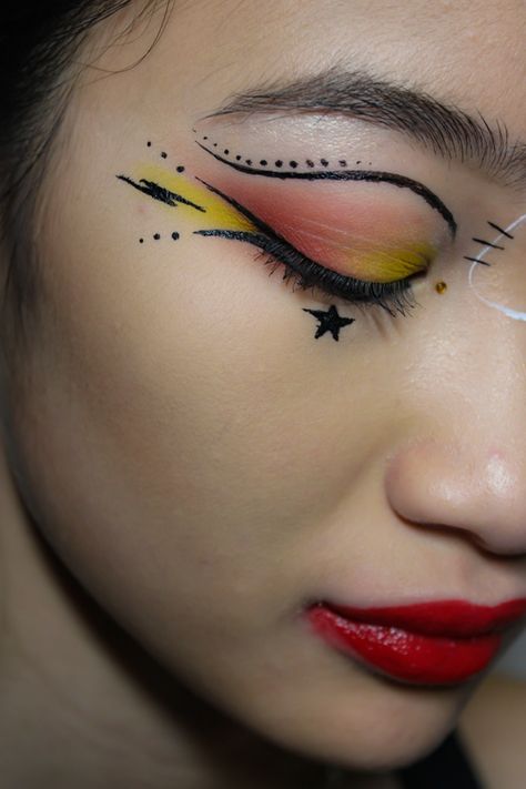 two-tone fire inspired makeup idea inspo inspiration, black and white eyeliner, red orange and yellow eyeshadow, lightning bolt eyeliner, costume, halloween fire makeup, extreme makeup, creative fun face paint art #makeup #firemakeup #eyemakeup #eyes #eyeshadow #eyeliner #aesthetic graphic liner red lipstick, lunar new year fun makeup, stars liner Orange And Yellow Eyeshadow, Fire Inspired Makeup, Fire Eyeliner, Red And White Makeup, Fun Face Paint, Black And White Eyeliner, Face Paint Art, Makeup Extreme, Eyeliner Aesthetic