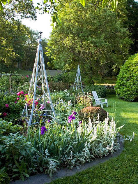 Who wouldn't be inspired by this stunning garden? Find more beautiful outdoor spaces: http://www.bhg.com/gardening/?socsrc=bhgpin071312minitrellises Flower Trellis, Garden Obelisk, Cottage Garden Design, Garden Trellis, Gorgeous Gardens, Garden Structures, Country Gardening, Garden Ornaments, Garden Spaces