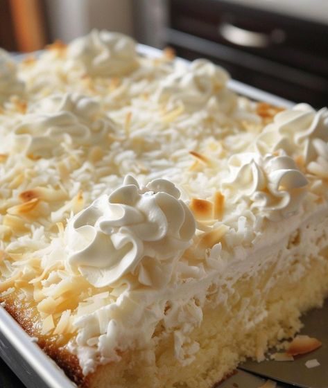 Coconut Poke Cake Recipe Coconut Poke Cake Recipe, Moist Coconut Cake Recipe, Coconut Poke Cake, Coconut Sheet Cakes, Coconut Poke Cakes, Coconut Cream Cake, Poke Cake Recipe, Blueberry Dump Cakes, Coffee Cake Recipes Easy