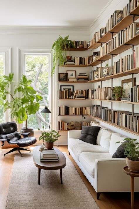 Discover chic shelving units to transform large walls into functional and stylish focal points. Maximize space with these design ideas. #StylishShelves #FunctionalDesign #HomeDecor Bookshelves In Living Room, Maximize Storage, Custom Shelving, Home Library Design, Shelving Units, Living Room Inspo, Home Library, Blank Walls, Home Office Design