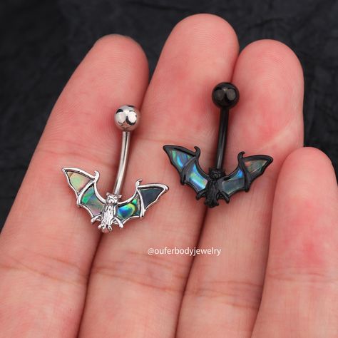 Material: 316L Stainless Steel Abalone Shell Size: Bar Thickness: 14G-1.6mm Bar Length: 10mm. This very fancy and Bat Wing belly ring comes in handy and represents the Halloween season and will be a perfect addition to your outfit for the Halloween events you're getting ready to attend. It's also embelished with a very sparkly Red CZ gem at the center and smaller ones all around the heart.  14G Bat Halloween Belly Ring/Belly Button Ring/Belly Piercing/Belly Button Piercing/Navel Jewelry/Belly Je Kawaii Belly Piercing, Cat Belly Button Piercing, Halloween Belly Button Rings, Kuromi Belly Piercing, Spider Belly Button Ring, Matching Belly Button Piercing Friends, Alt Belly Button Piercing, Bat Belly Button Piercing, Different Belly Button Piercings