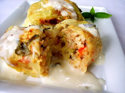 Stuffed Cabbage with Basil White Wine Cream Sauce - Proud Italian Cook.  Try substituting the rice for a bit of farro White Cream Sauce, Wine Cream Sauce, White Wine Cream Sauce, Cheese Vegetables, Stuffed Cabbage Rolls, Cabbage Rolls Recipe, Stuffed Cabbage, White Wine Sauce, Cabbage Rolls