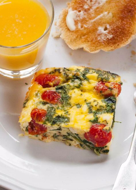 Frittata Squares with Spinach, Tomatoes, and Feta Tomato Frittata, Tomatoes And Feta, Make Ahead Brunch, Spinach Frittata, Frittata Recipe, Feta Recipes, Bacon Tomato, Frittata Recipes, Spinach And Cheese