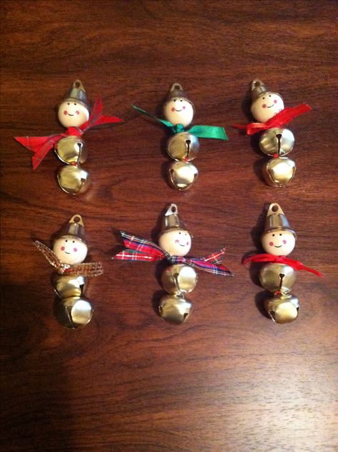 Jingle bell Snowmen ornaments Jingle Bell Ornaments Diy, Bell Ornaments Diy, Bell Crafts, Jingle Bell Ornaments, Jingle Bell Crafts, Bead Dolls, Xmas Bells, Cork Crafts Christmas, Snowmen Ornaments