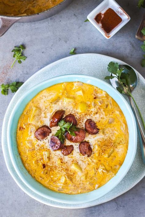 German Sauerkraut Soup with Sausage & Potatoes (Traditional Recipe) Sour Kraut Soup, Sauerkraut Balls, German Appetizers, Pork And Sauerkraut, German Sauerkraut, Soup With Potatoes, Soup With Sausage, Sausage And Potatoes, Raw Cabbage