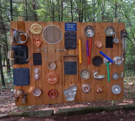 Recycled and repurposed pots, pans and music makers fill a cedar fence panel to create a musical, sensory experience for visually impaired youth. Kid Garden, Eyfs Outdoor, Houses Minecraft, Cedar Paneling, Alka Seltzer, Homemade Instruments, Sensory Wall, Sound Wall, Metal Objects