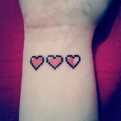 36 Insanely Geeky Tattoos Pixel Heart Tattoo, Minecraft Tattoo, Pixel Tattoo, Video Game Tattoos, Mario Tattoo, Nerdy Tattoos, Zelda Tattoo, Gamer Tattoos, Nerd Tattoo