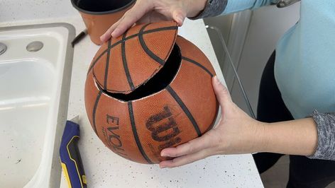 If you have an old basketball at home that no one is using anymore, why not turn it into a pretty plant pot? This Basketball Pot Plant, Basketball Plant Pot, Basketball Diy, Basketball Planter, Old Basketball, Diy Basketball, Pretty Plant, Basketball Party, Mini Basketballs