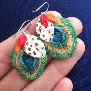 I saw the most beautiful peacock feather earrings on etsy … | Flickr Stephanie Kilgast, Sculpey Ideas, Fimo Art, Native Earrings, Peacock Feather Earrings, Jewelry Clay, Fimo Polymer Clay, Polymer Inspiration, Lampwork Jewelry