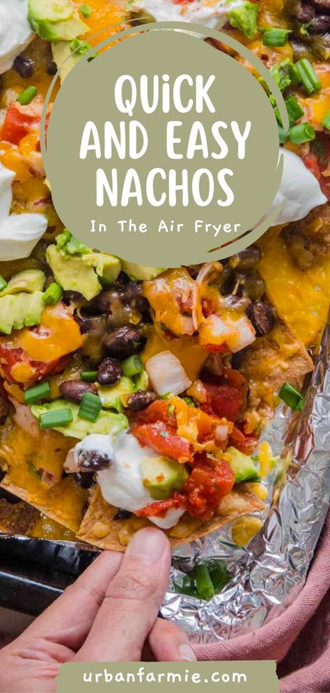 Craving nachos but don't want to spend hours in the kitchen? These quick and easy air fryer nachos will solve your problem. With just a few minutes of prep, you can have a delicious meal that everyone will love. So ditch the oven and try out this air fryer recipe today! Airfryer Nachos Recipe, Nachos Recipe Air Fryer, Air Fryer Nachos With Meat, 21 Layer Air Fryer Nachos, Air Fryer Taco Recipes, Air Fry Nachos, One Pot Air Fryer Meals, Air Fryer Nachos Recipes, Air Fryer Chicken Nachos