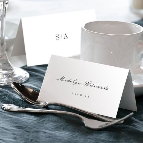 $1.35 | Sophisticated monogram minimal Foldable Place Card #cheap affordable wedding place card, sophisticated classic script, gold and white, simple elegance, formal elegant winter wedding, classy vintage fall wedding, luxury spring summer wedding, modern chic minimalist, professional typography Wedding Table Placement, Placement Cards, Elegant Winter Wedding, Couples Monogram, Wedding Table Number Cards, Wedding Place Card, Table Number Cards, White Minimalist, Wedding Vibes