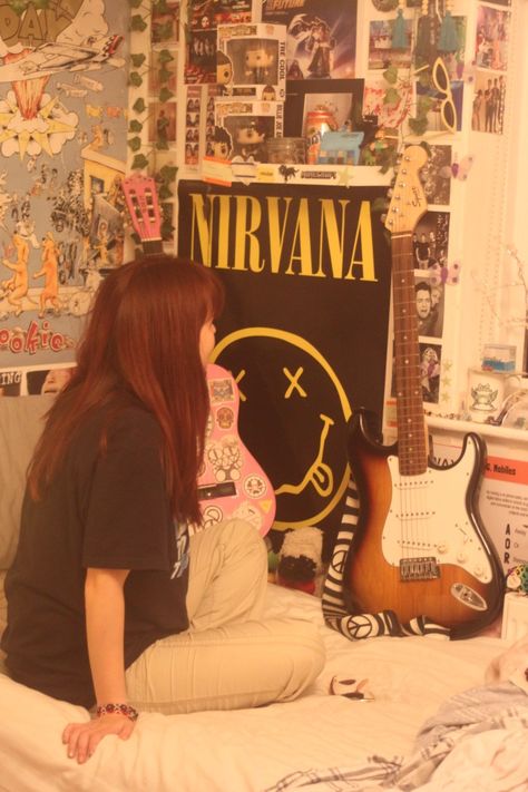 posters, guitars, teenage bedroom, grunge, camera photo Teenage Dirtbag Bedroom, Grunge Room Decor Punk Rock Bedroom Ideas, Grunge Camera, Teenage Dirtbag Room, Room With Posters Aesthetic Grunge, Teenage Dirtbag Room Decor, Teenage Dirtbag Aesthetic Room, Teenage Musician Bedroom, Art Bedroom Ideas