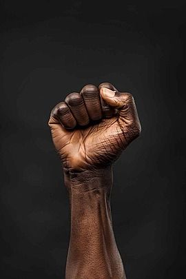 the hand raised with closed fist black power protest and revolution gesture lives matter Backgroun Black Power Wallpaper, Garnet Steven, God Hand, Afro Comb, Garnet Steven Universe, Modern Tv Unit Designs, Hand Raised, Power Wallpaper, Graphic Design Tutorials Learning