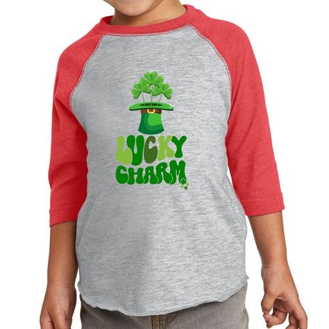 Get your little ones ready for St. Patrick's Day with our charming and lucky St. Patrick's Day shirt. This shirt is perfect for kids, featuring a delightful design with a Leprechaun hat and shamrocks. With its comfortable fit, this toddler baseball tee is the perfect choice for your little lucky charm. Let your toddler feel extra lucky on this special day with our toddler lucky shirt. Whether you're celebrating or just feeling lucky, this St. Patrick's Day shirt is a must-have. Shop now and bring some extra charm to your little one's wardrobe. When toddlers wear this classic Three-Quarter Sleeve Tee made of 100% combed ringspun cotton, they just can't go wrong! - The Rabbit Skins Toddler Baseball Jersey 3/4 Sleeve Tee is crafted from 100% ring-spun combed cotton, providing a soft and comfo