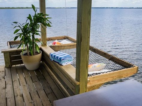 A freaking DOCK HAMMOCK. | 19 Things You'll Definitely Want For The Lake This Summer Lake Deck Ideas Boat Dock, How To Build A Dock On A Lake, Waterfront Dock Ideas, Outdoor Lake Living, Deck On Lake House, Lake House Outdoor Living, Lakeside Dock Ideas, Waterfront Deck Ideas, Lake House Essentials Summer