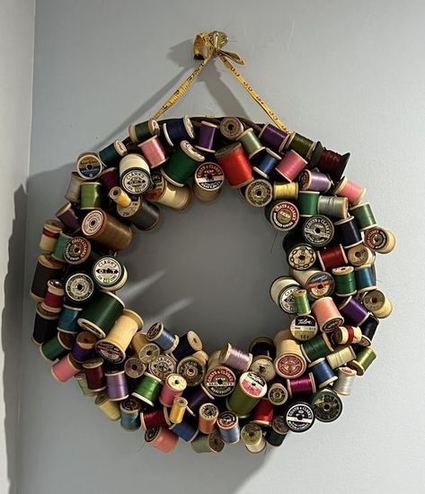 Recycle, Reuse and Repurpose  !! | Made a wreath out of old wooden spools of thread | Facebook Thread Spool Wreath, Spools Of Thread Crafts, Wood Spool Crafts, Wooden Thread Spool Ideas, Thread Spool Crafts, Spool Wreath, Spool Art, Wooden Spool Projects, Wooden Spool Crafts