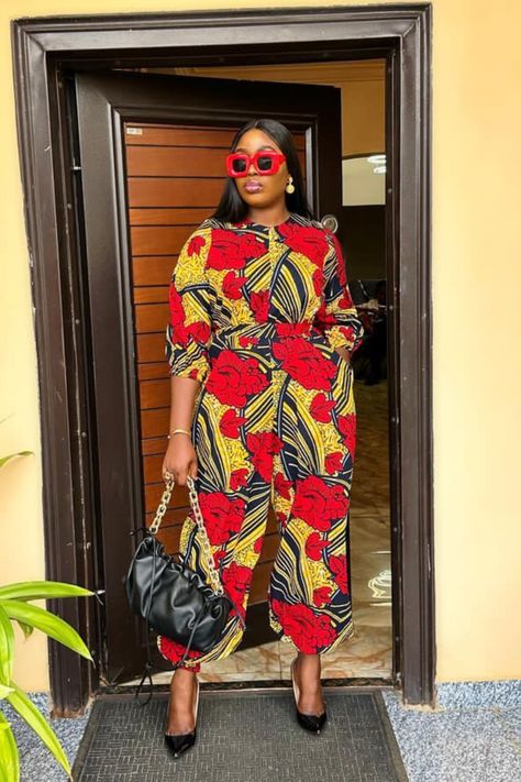 A lady wearing an Ankara jumpsuit Latest Ankara Jumpsuit Styles, Ankara Jumpsuit Styles, Dresses Videos, Jumpsuit Styles, Ankara Jumpsuit, Dresses African, African Styles, Latest Ankara, Birthday Shoot