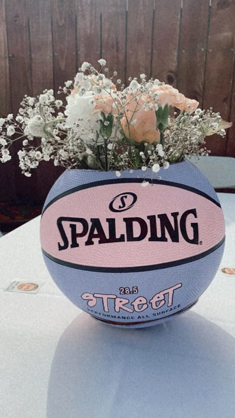 Basketball Jersey Centerpiece, Basketball Quinceanera Ideas, Pink Basketball Party Ideas, Basketball With Flowers, Jordan Party Centerpieces, Pink Basketball Birthday Party, Basketball Themed Wedding, Girls Basketball Birthday Party, Basketball Wedding Ideas