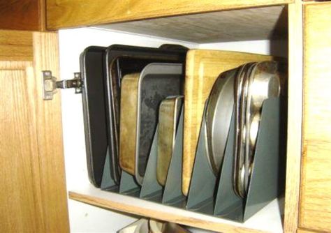 20 Genius Ways to Organize Your Kitchen Cabinets - The Krazy Coupon Lady Baking Pans Storage, Cookie Sheet Storage, Diy Kitchen Hacks, Simple Kitchen Cabinets, Kitchen Cabinet Organization Ideas, Pan Storage, Space Saving Kitchen, Kitchen Pantry Cabinets, Kitchen Cabinet Organization