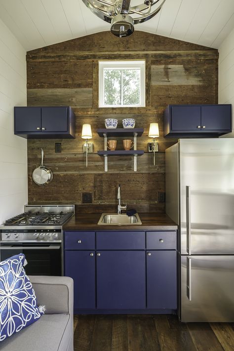 Look at all the storage in this tiny house kitchen! #tinyhouse #trailer #design #kitchen Wohne Im Tiny House, Tiny Kitchen Design, Tiny House Interior Design, Basement Kitchen, Best Tiny House, Tiny House Kitchen, Tiny Cabin, Tiny House Movement, House Design Kitchen