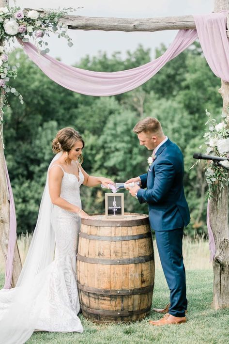 Bride and groom having a sand ceremony.  The sand is on a whiskey barrel under the arbor at Red Acre Barn. Photo taken by Sherry Peterson Photography and design: https://spphotographydesign.com/ Whiskey Barrel Wedding, Distillery Wedding, Fairy Tail Wedding, Sand Ceremony Wedding, Unity Sand Ceremony, Have The Best Day, Wedding Sand, Unity Ceremony, Wedding Unity