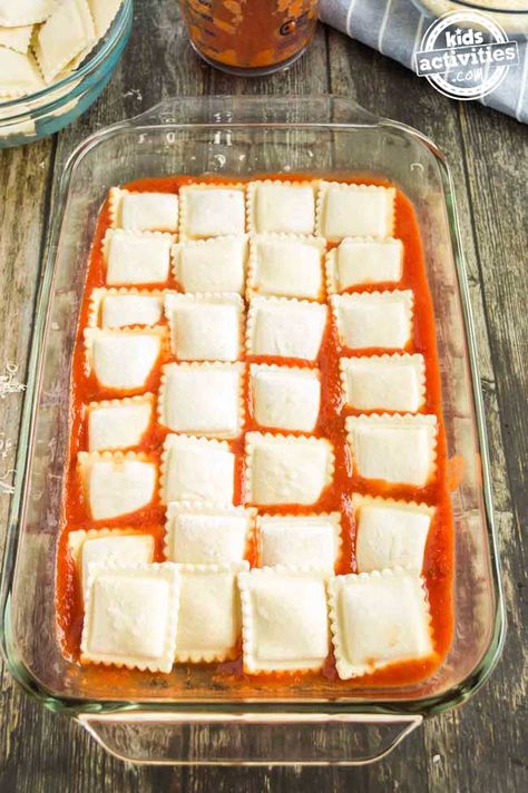 Easy Cheesy Baked Ravioli Recipe Kids Activities Blog Cheesy Ravioli Recipe, Cheese Ravioli Recipes, Cheesy Ravioli, Baked Ravioli Recipe, Ravioli Recipes, Baked Ravioli, Easy Recipies, Ravioli Bake, Ravioli Recipe