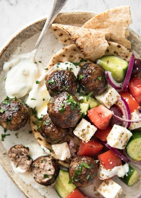 Soft, juicy, beautifully flavoured GREEK MEATBALLS! Serve as an appetiser with tzatziki, main with Greek Salad or make wraps! www.recipetineats.com Greek Meatballs Recipe, Pane Pita, Greek Meatballs, Resep Diet, Meatball Recipe, Greek Dishes, Mediterranean Diet Recipes, Meatball Recipes, Jamie Oliver