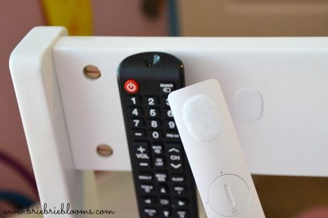 We recently added a TV to my daughter‘s bedroom and struggled with finding a place to safely keep the remote. She spends a lot of time playing in her room and a small remote could easily end up lost. Her tall loft bed makes it challenging to ask her to put away the remote at {Read More...} Diy Storage Solutions, Rv Camping Checklist, Remote Control Storage, Rv Organization, Camper Storage, Rv Storage, Rv Hacks, Camping Checklist, Smart Lock