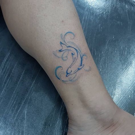 Dolphin Henna Tattoo, Small Tattoos Dolphin, Dolphin Heart Tattoo, Dolphin Wave Tattoo, Small Dolphin Tattoo Simple, Dolphin Tattoo For Women, Small Dolphin Tattoo, Wave Tattoo Foot, Dolphin Tattoo Design