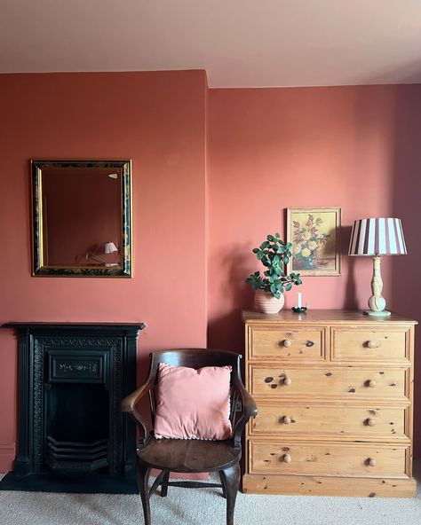 1 Cosy Bedroom Corner 🕯️ ✨- in 4 ways! Which is your favourite? Although this bedroom was only decorated just over a year ago this shows how much I like to shift furniture around! But really this post is to hail the impact of this beautiful warm terracotta paint colour on this previously greyish north facing room! Captured in different seasons and lights - this room still glows! Have you got a paint colour that never fails to evoke warmth and cosiness? I also think this is me slowly easing ... Colour Drench Pink Bedroom, Red Paint Bedroom, Colour Drench Bedrooms, Terra Cotta Room, Pink Bedroom Paint, North Facing Bedroom, North Facing Room, Terracotta Interior Design, Terracotta Bedroom