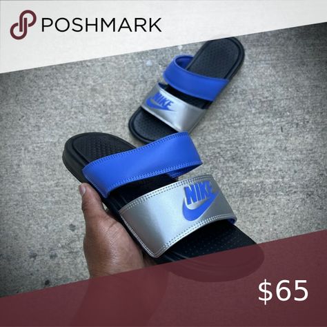 WMNS NIKE BENASSI DUO
ULTRA SLIDES BLACKS ROYALS BLUES SILVERS Nike Benassi Duo, Nike Benassi, Women Nike, Slides Women, Flip Flop, Slide Sandals, Blue And Silver, Royals, Nike Shoes