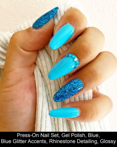 A gel polish, press-on nails set complete with blue color, blue glitter accents, and rhinestone detailing. Nail glue included in every purchase. #blue #nail #design #ideas Blue Glitter Summer Nails, Bright Blue Gel Nails, Aqua Glitter Nails, Beach Summer Nails, Neon Blue Nails, Summertime Nails, Glitter Gel Nail Designs, Glitter Toe Nails, Birthday Nail