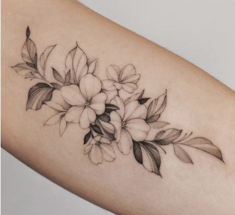 Magnolia Bloom Tattoo, Medium Flower Tattoo, Spirea Flower Tattoo, Primrose Tattoo Design, Dogwood Tattoo, Tropical Flower Tattoos, Arm Wrap Tattoo, Bloom Tattoo, Hip Thigh Tattoos