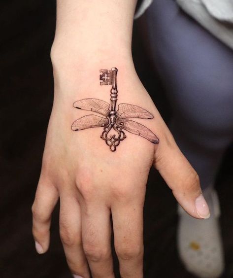 Dragonfly and key hand tattoo by @reyr1tattoo Dragon Fly Hand Tattoo, Dragonfly Key Tattoo, Dragonfly Hand Tattoo, Antique Tattoo Ideas, Skeleton Key Tattoo, Antique Tattoo, Dragonfly Tattoos, Small Dragonfly Tattoo, Our Mindful Life